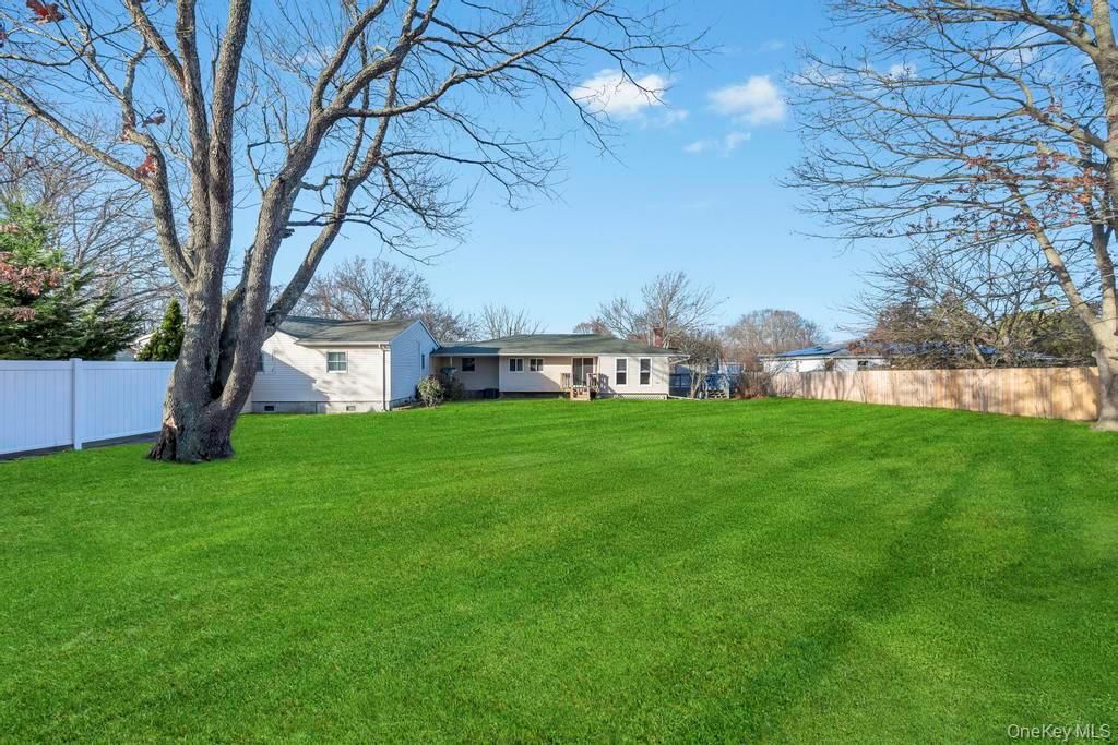 Photo of 10 Westwind Drive, Bohemia, NY 11716 (MLS # 940701)