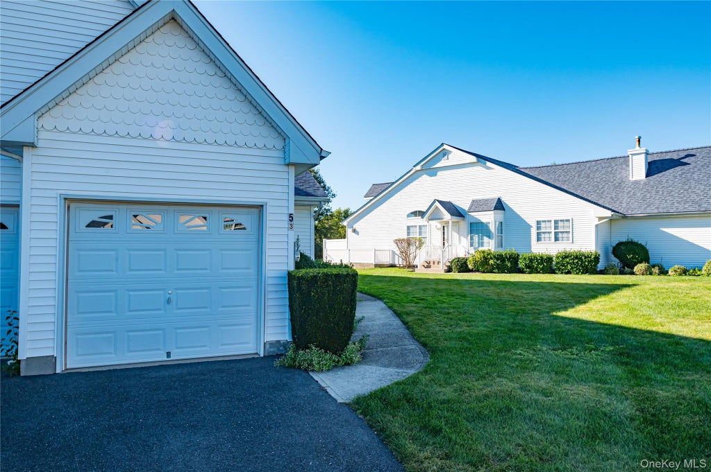 Photo of 53 Summerfield Lane N, Aquebogue, NY 11901 (MLS # 1060055)