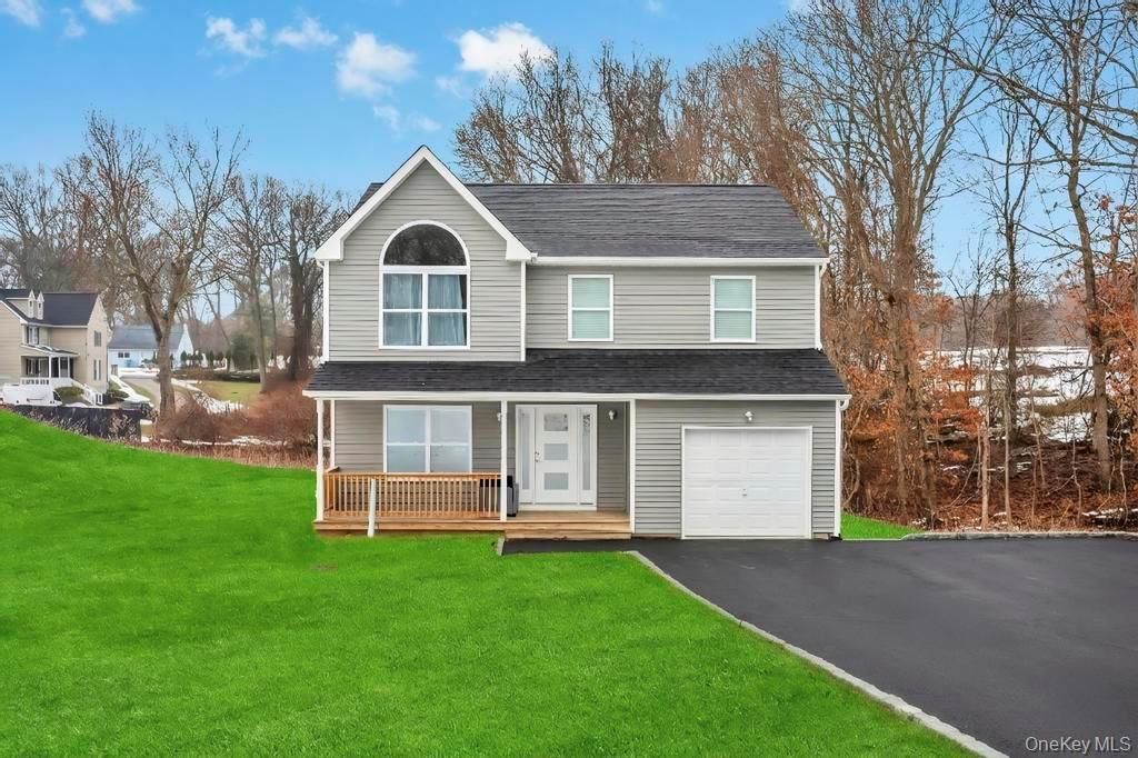 Photo of 65 Ozark Street, Riverhead, NY 11779 (MLS # 971480)