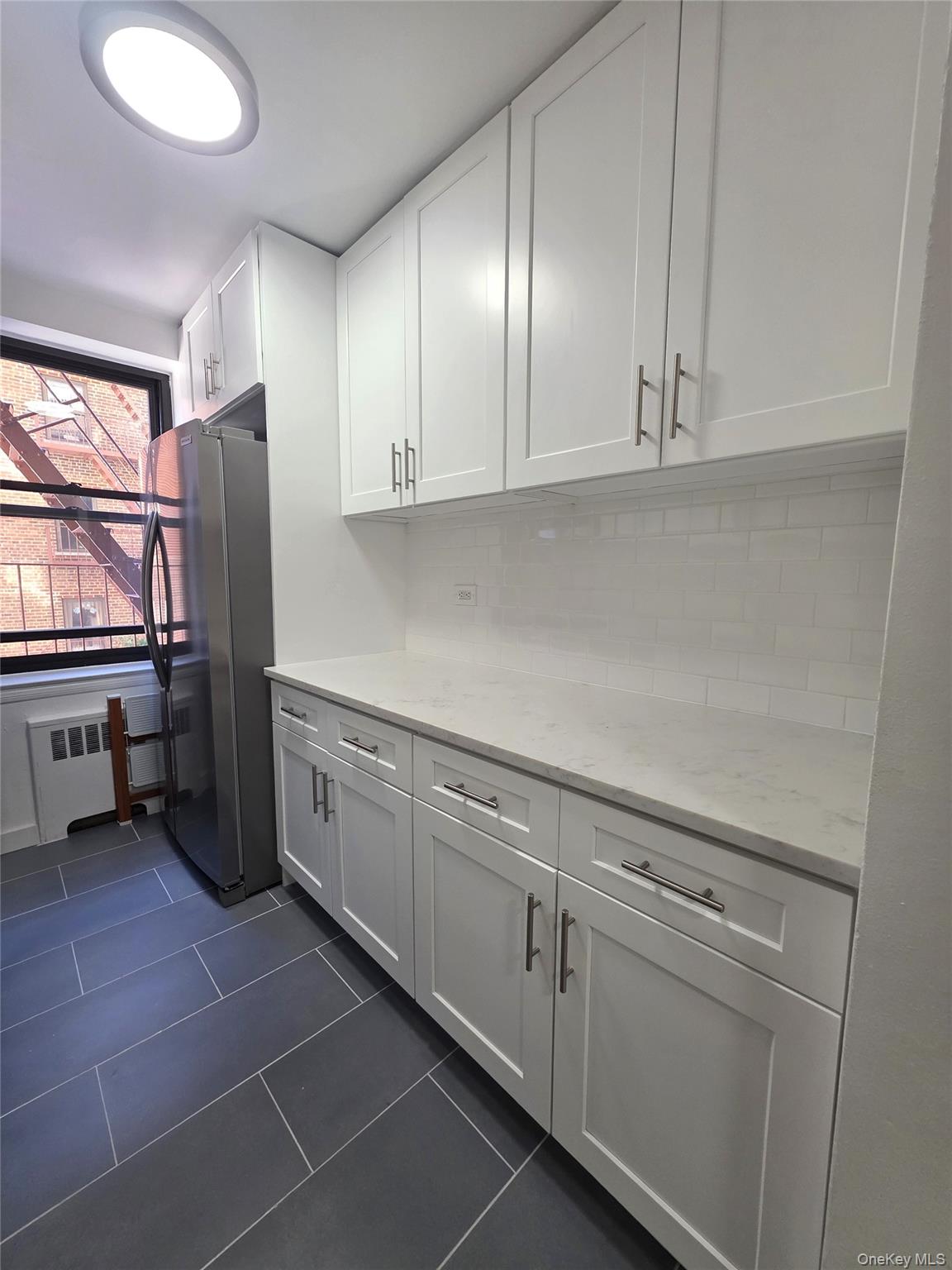 91-08 32nd Avenue E207