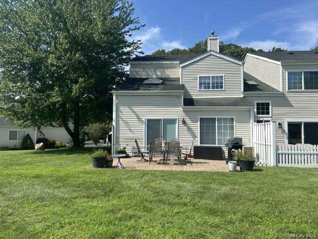 Photo of 104 Owls Nest Court, Manorville, NY 11949 (MLS # 1038860)