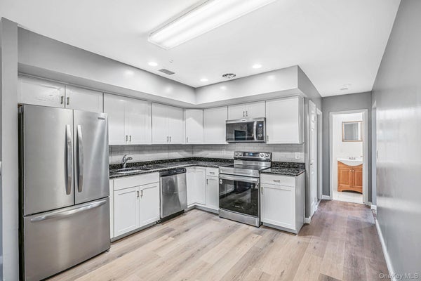 415 CLUBHOUSE CT # 51, CORAM, NY 11727 - Image 8d1ffd54d6c8c740b8485d8497b21e96/38683794