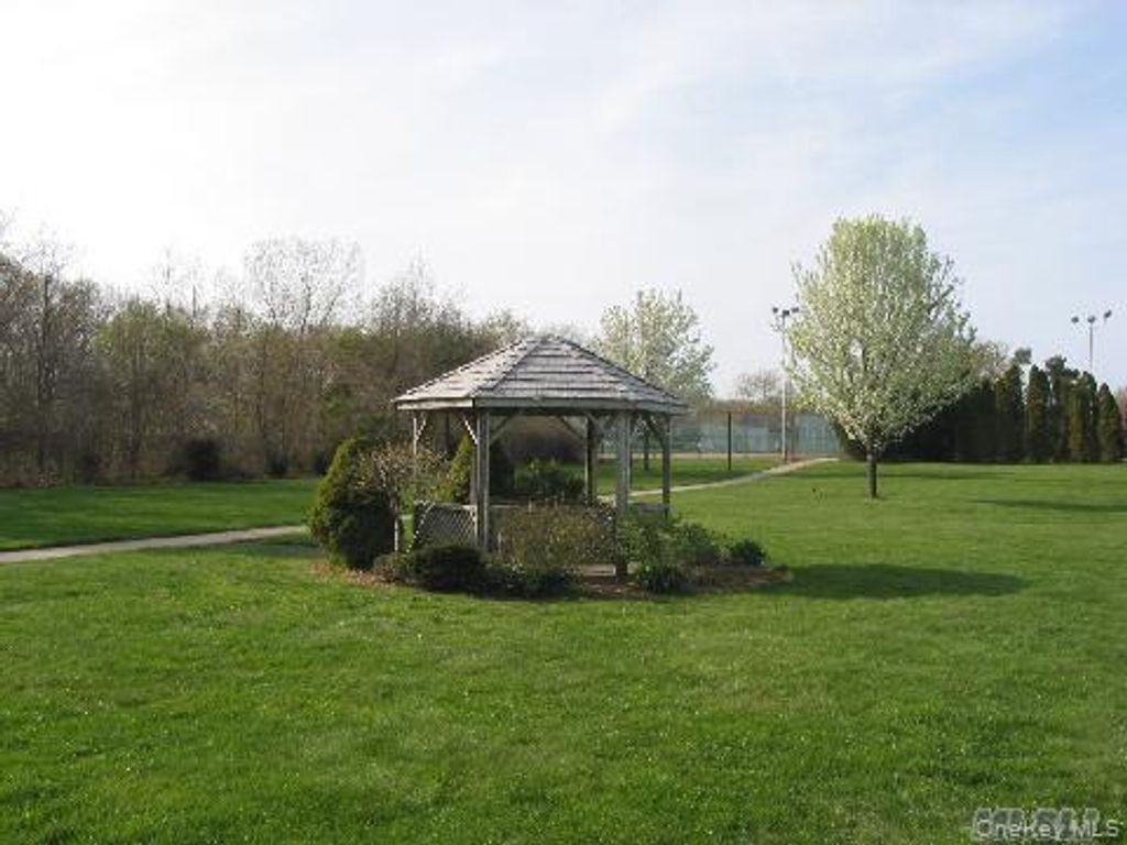 Photo of 226 Pointe Cir #226, Coram, NY 11727 (MLS # 928430)