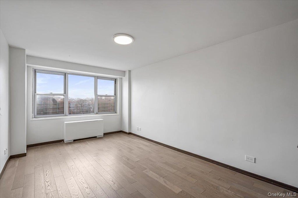 Photo of 85-15 Main Street #12J, Briarwood, NY 11435 (MLS # 1041418)