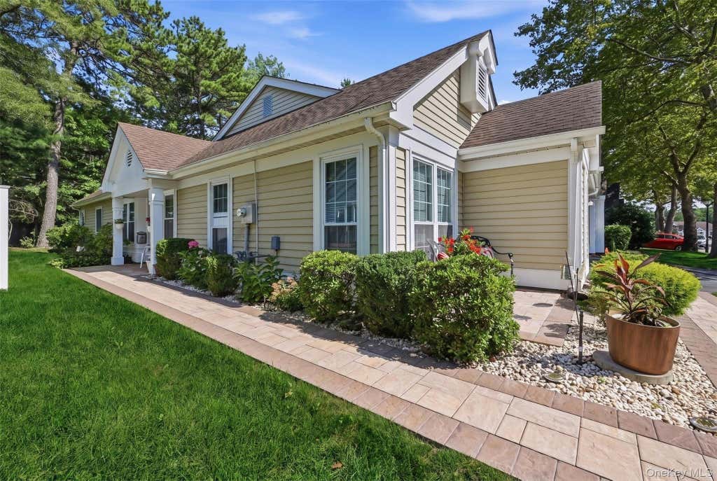 Photo of 15 Glen Drive, Ridge, NY 11961 (MLS # 1042900)