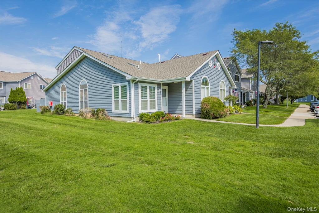 Photo of 764 Birchwood Park Drive, Middle Island, NY 11953 (MLS # 1051486)