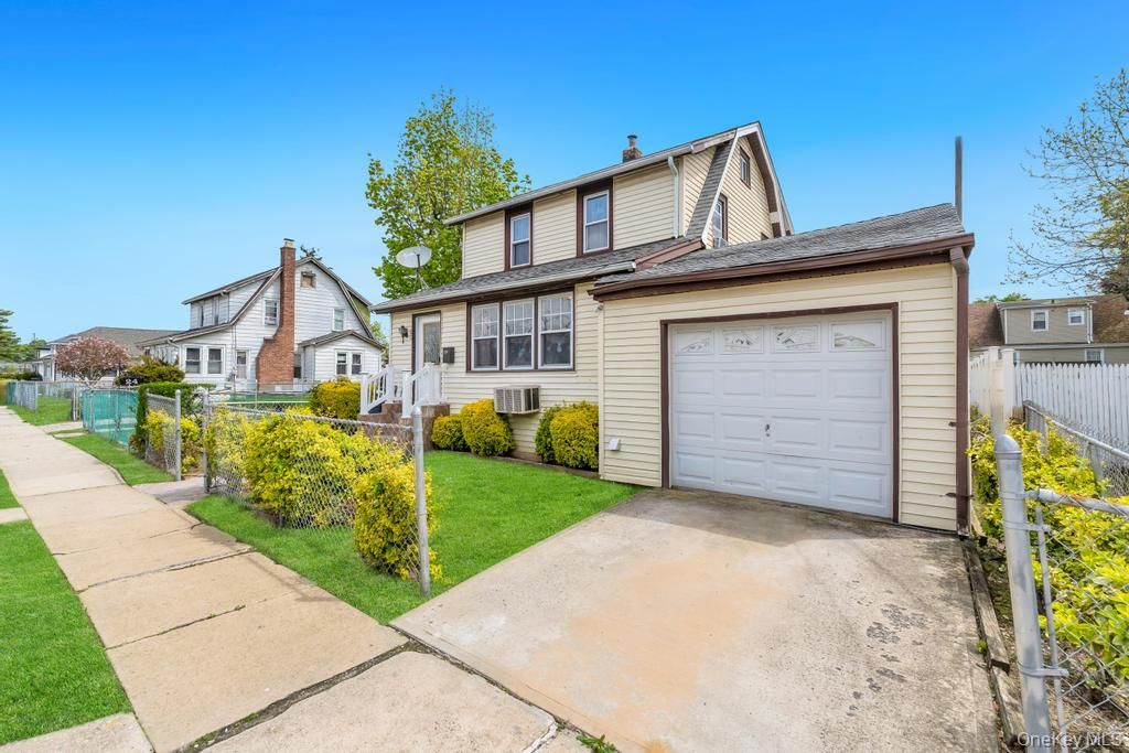Photo of 20 Ronald Place, Roosevelt, NY 11575 (MLS # 990980)