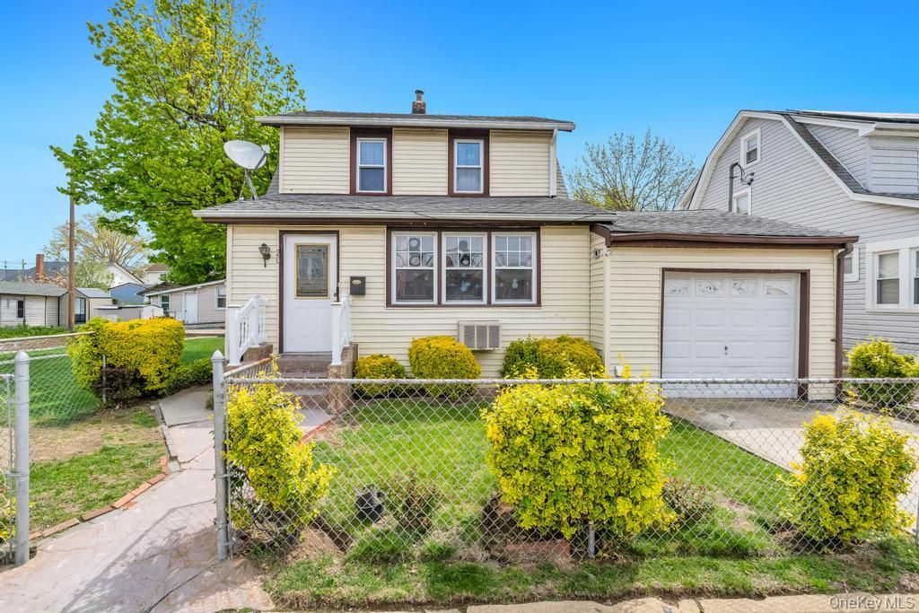 Photo of 20 Ronald Place, Roosevelt, NY 11575 (MLS # 990980)