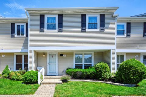 Photo of 100 Baker Court #36, Island Park, NY 11558 (MLS # 888667)