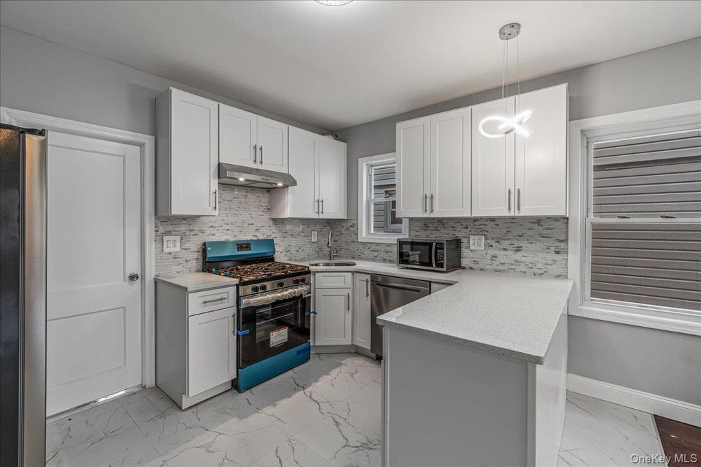 Photo of 8925 201st Street, Hollis, NY 11423 (MLS # 946058)