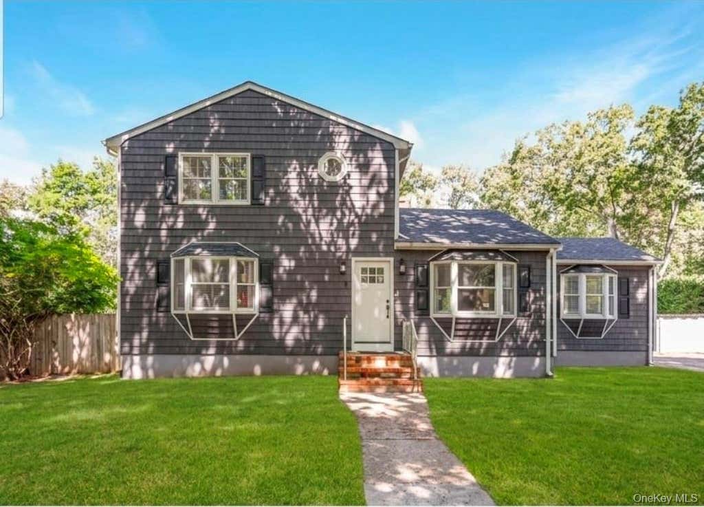 Photo of 9 Half Moon Pond Road, Ridge, NY 11961 (MLS # 1039022)