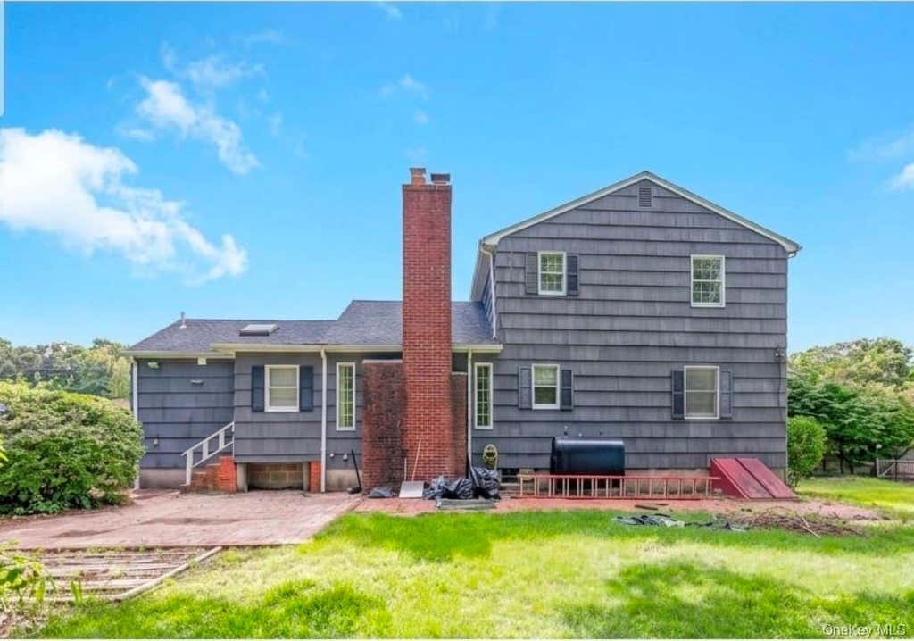 Photo of 9 Half Moon Pond Road, Ridge, NY 11961 (MLS # 1039022)