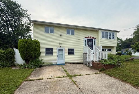 Photo of 411 Mayflower Avenue, Brentwood, NY 11717 (MLS # 1028270)