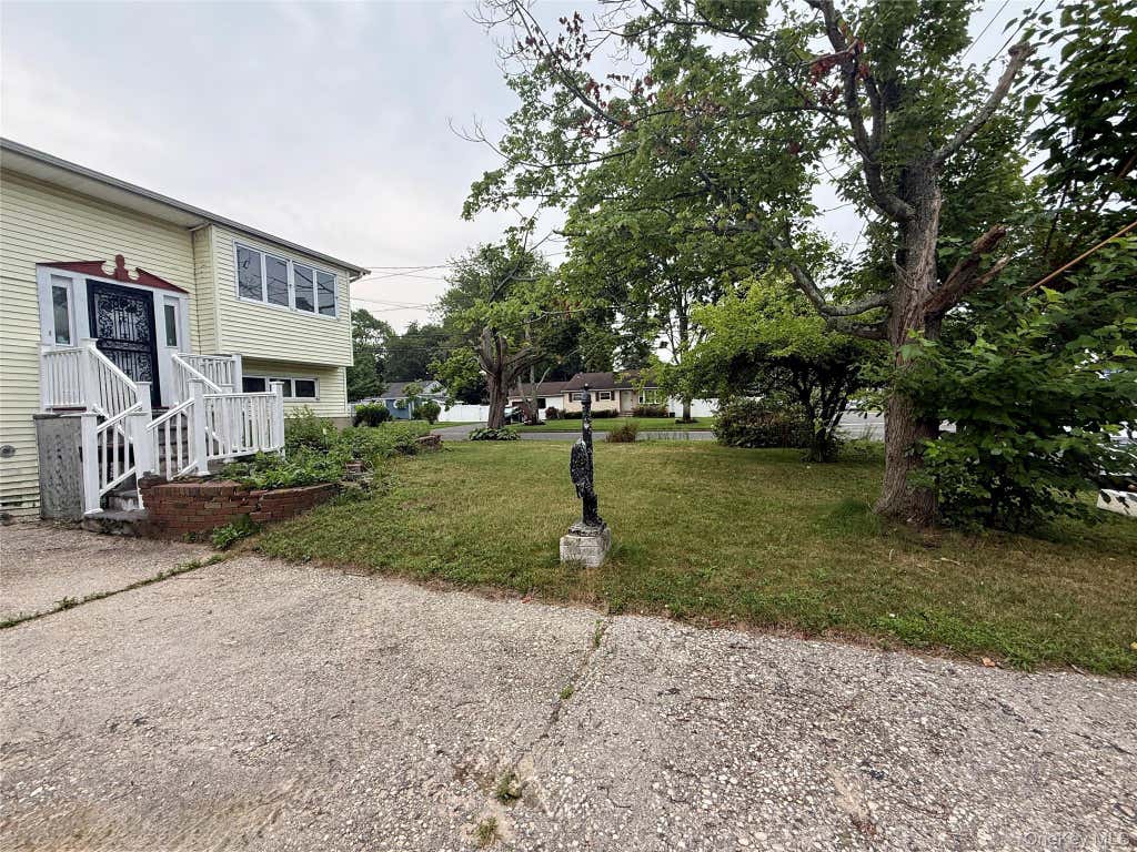 Photo of 411 Mayflower Avenue, Brentwood, NY 11717 (MLS # 1028270)