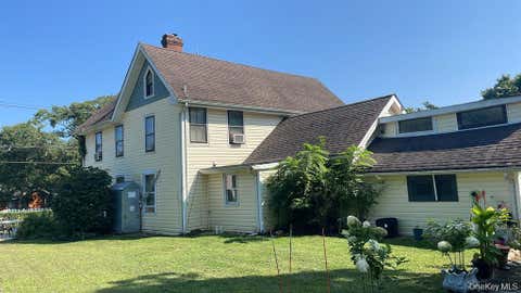 Homes For Sale - 134 Ponquogue Avenue<br/> Hampton Bays, NY 11946