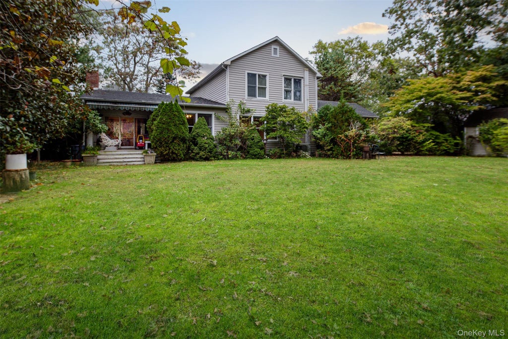 Photo of 50 Argonne Road E, Hampton Bays, NY 11946 (MLS # 1066179)