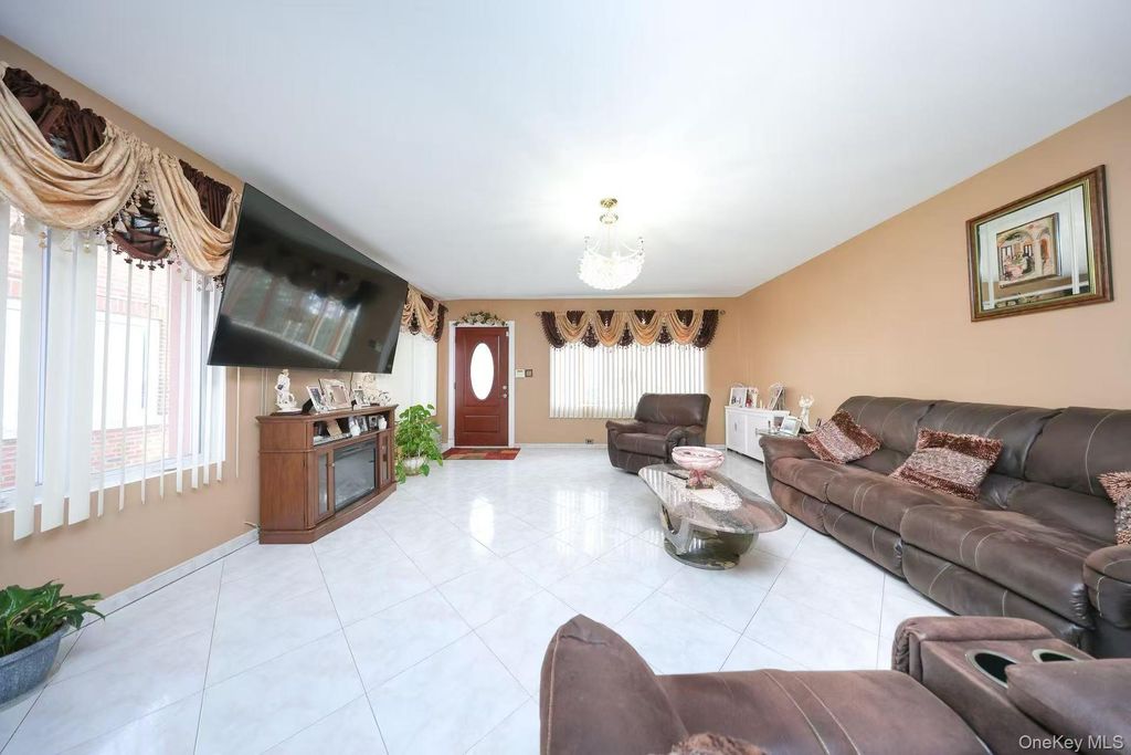 Photo of 8743 Union Turnpike, Glendale, NY 11385 (MLS # 957378)