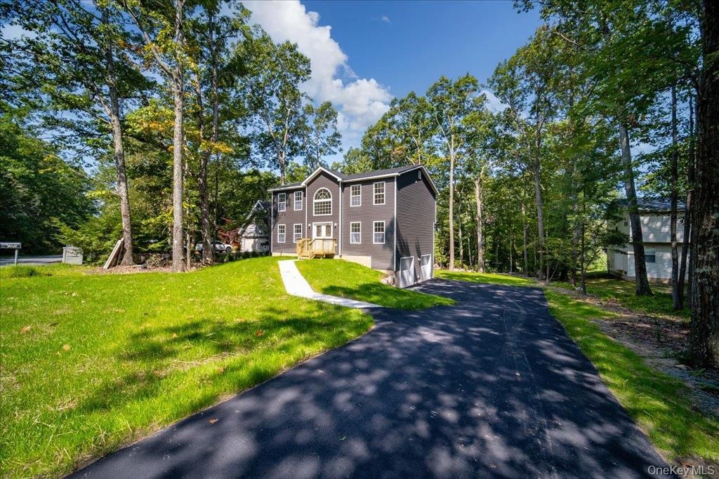 Photo of 677 Marsh Road, Glen Wild, NY 12738 (MLS # 993900)