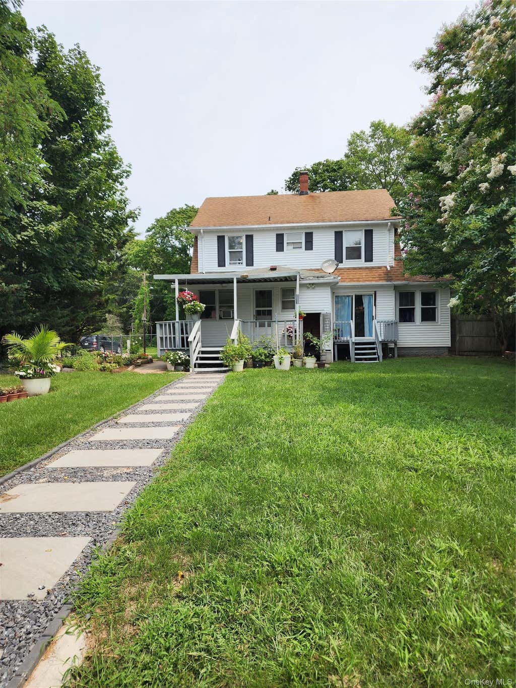 Photo of 41 Prospect Place, Riverhead, NY 11901 (MLS # 1037571)