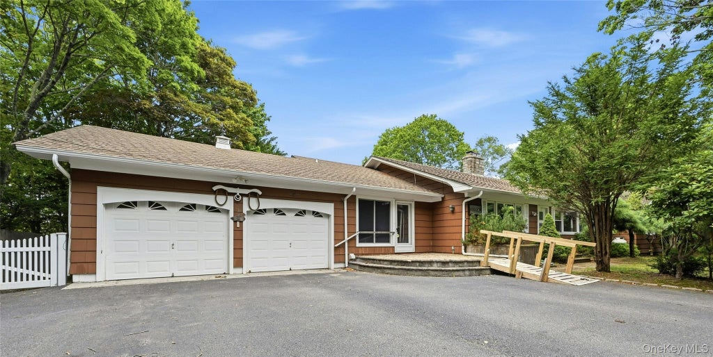 Photo of 31 Tuthill Point Road, East Moriches, NY 11940 (MLS # 1031681)