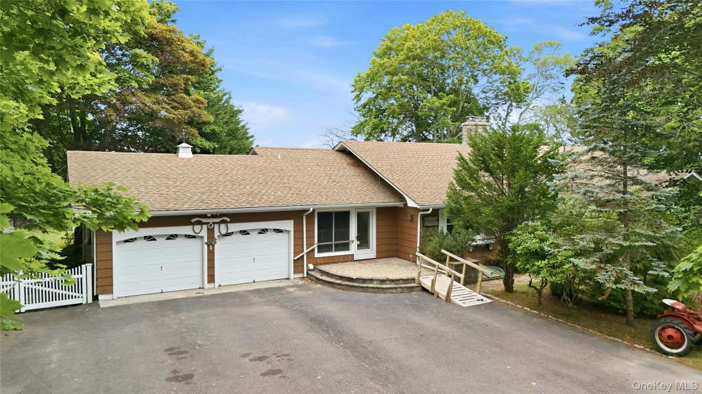 Photo of 31 Tuthill Point Road, East Moriches, NY 11940 (MLS # 1031681)