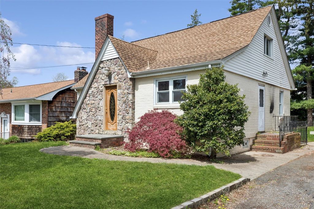 Photo of 107 E 25th Street, Huntington Station, NY 11746 (MLS # 990266)