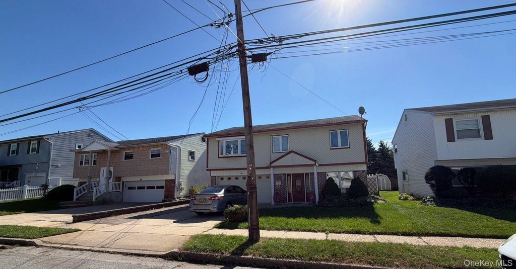 Photo of 61 Morton Avenue, Freeport, NY 11520 (MLS # 1063995)