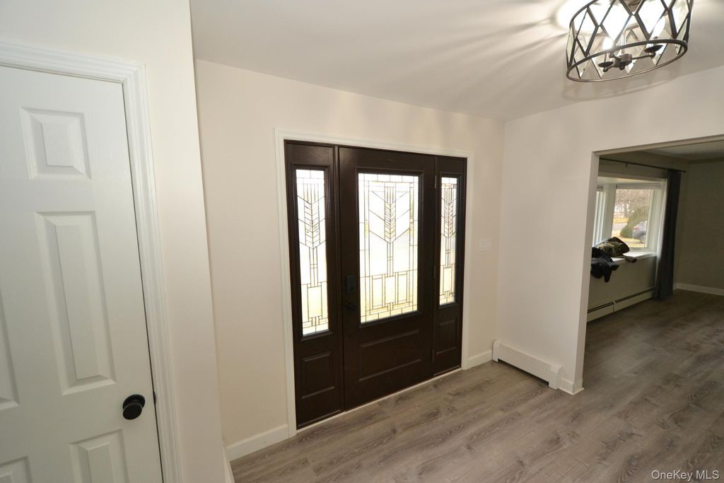 Photo of 34 Stewart Circle N, Centereach, NY 11720 (MLS # 949611)