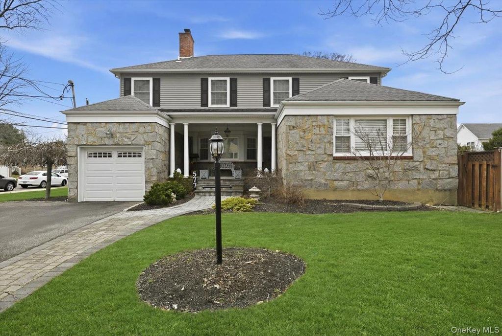 Photo of 577 Waukena Avenue, Oceanside, NY 11572 (MLS # 976998)