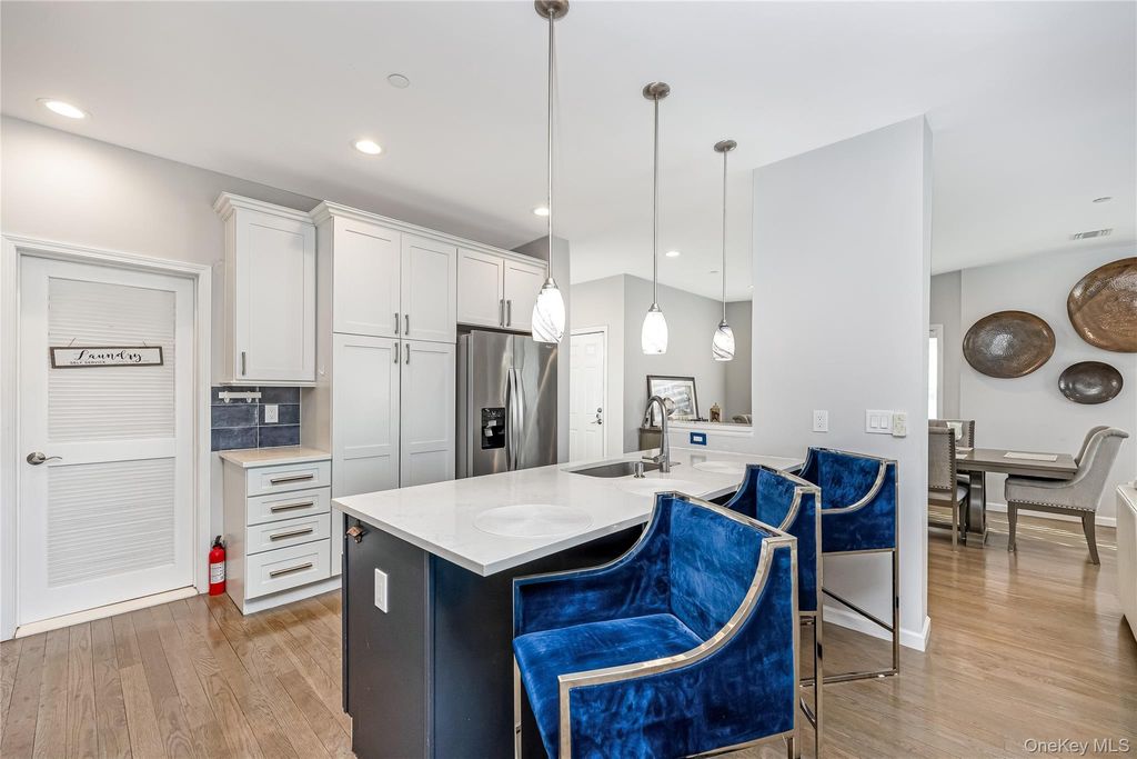 Photo of 718 Guy Lombardo Avenue, Freeport, NY 11520 (MLS # 977426)