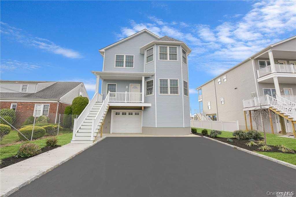 Photo of 718 Guy Lombardo Avenue, Freeport, NY 11520 (MLS # 977426)