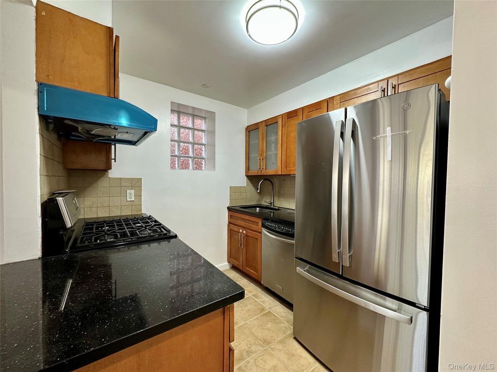 Photo of 91-06 Whitney Avenue, Elmhurst, NY 11373 (MLS # 994216)