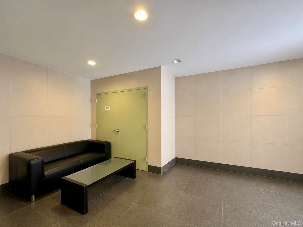 Photo of 91-06 Whitney Avenue, Elmhurst, NY 11373 (MLS # 994216)