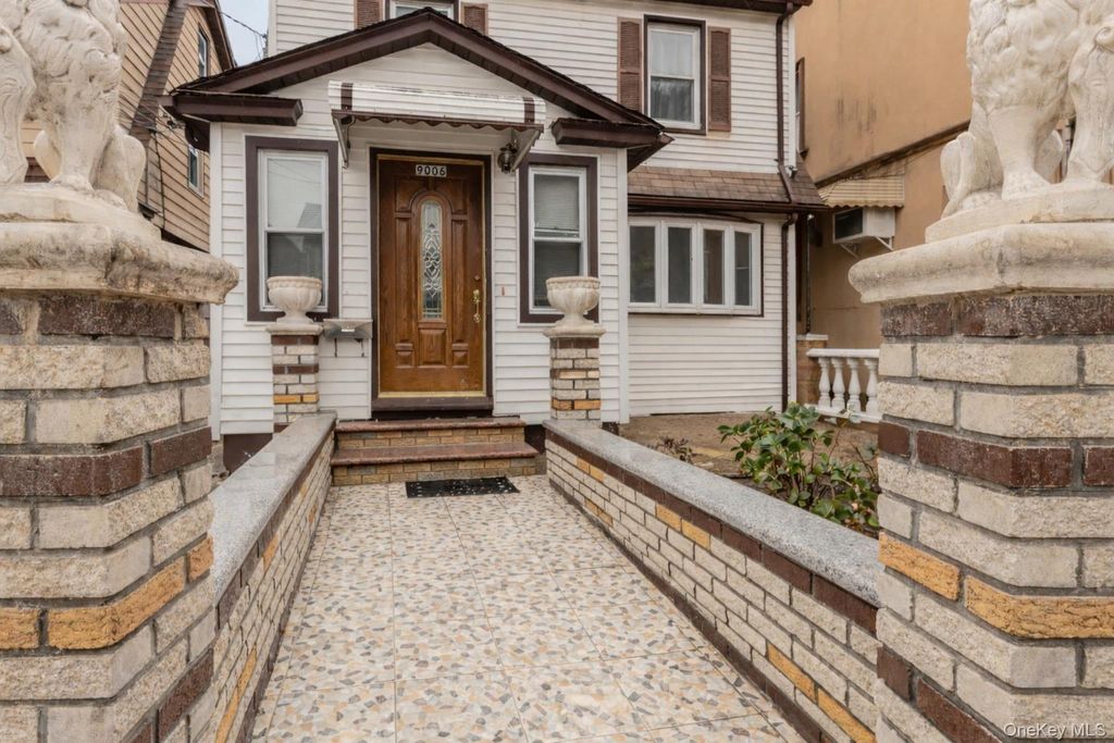 Photo of 9006 107th Avenue, Ozone Park, NY 11417 (MLS # 1021993)