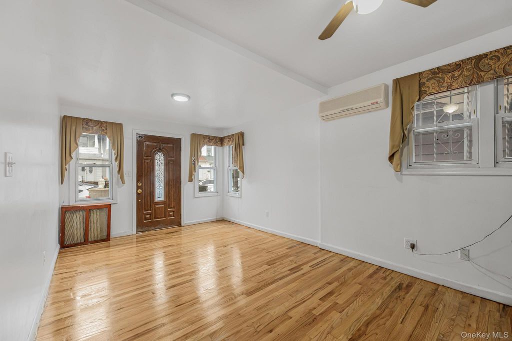 Photo of 9006 107th Avenue, Ozone Park, NY 11417 (MLS # 1021993)
