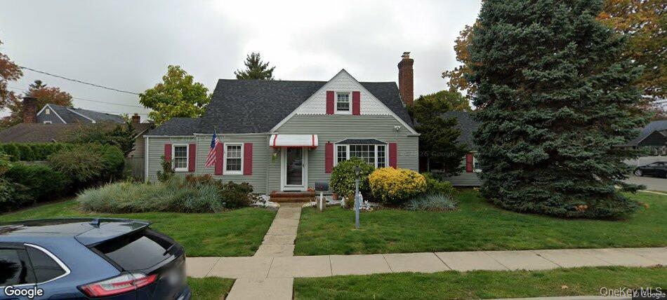 Photo of 295 Ivy Avenue, Westbury, NY 11590 (MLS # 1034366)