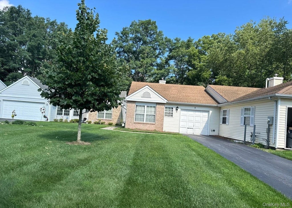 Photo of 6 Chipmunk Trail, Coram, NY 11727 (MLS # 1064532)