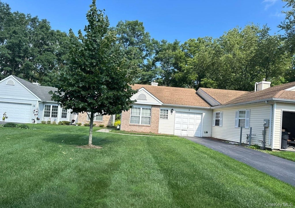 Photo of 6 Chipmunk Trail, Coram, NY 11727 (MLS # 1064532)