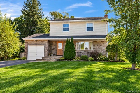Photo of 65 Genesee Drive, Commack, NY 11725 (MLS # 1059067)