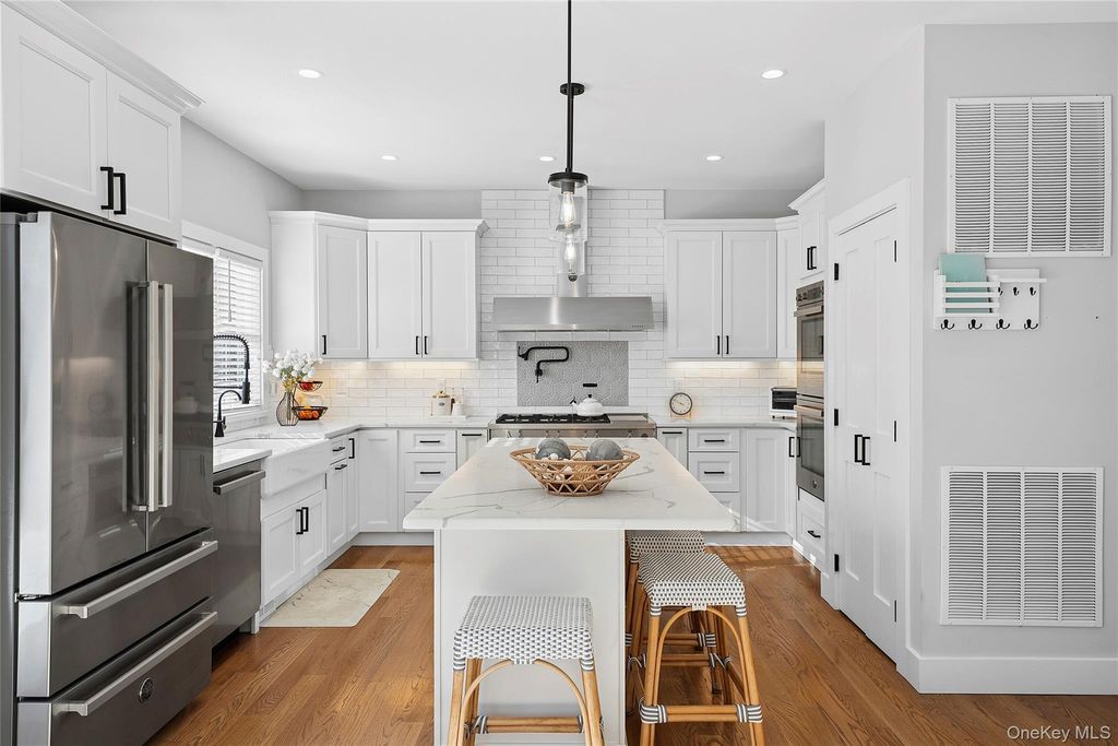 Photo of 55 Squires Avenue, East Quogue, NY 11942 (MLS # 964875)