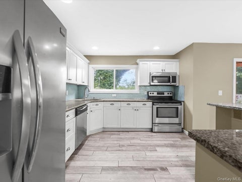 Photo of 112 Rosemont Avenue, Farmingville, NY 11738 (MLS # 1065830)