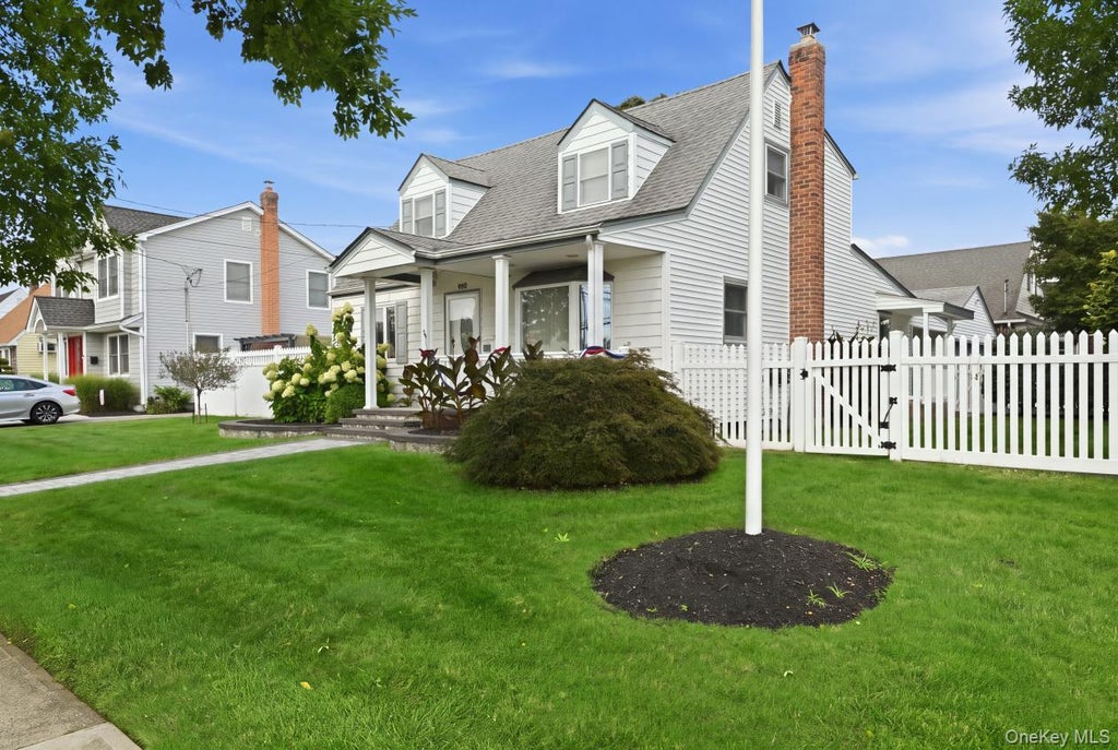 Photo of 980 Washington Avenue, Westbury, NY 11590 (MLS # 1063230)