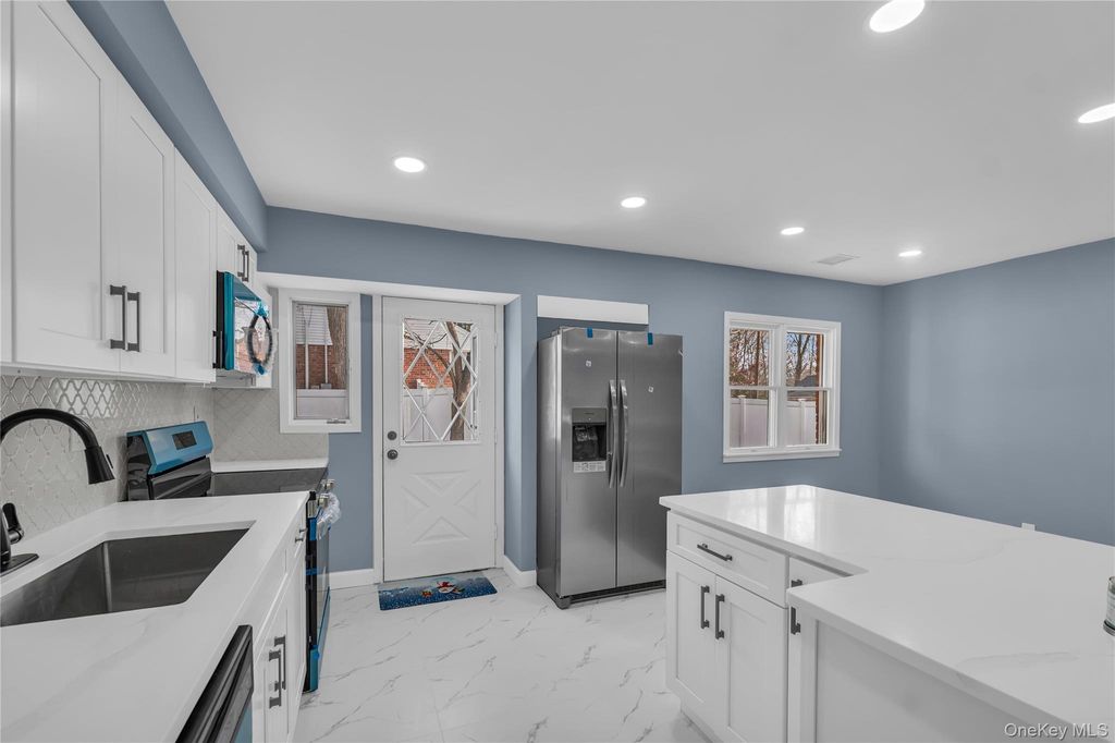 Photo of 585 Elwood Road, East Northport, NY 11731 (MLS # 943327)