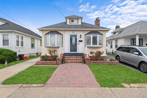 Photo of 93 Island Parkway, Island Park, NY 11558 (MLS # 876628)