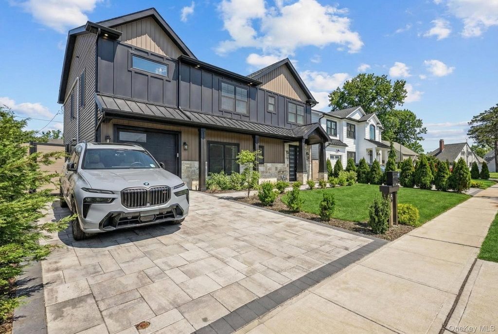 Photo of 36 Foster Lane, Westbury, NY 11590 (MLS # 969340)