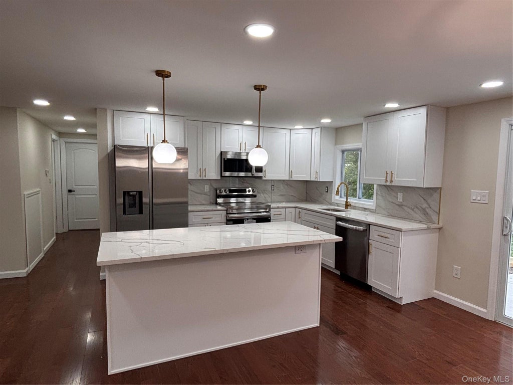 Photo of 9 Balsam Drive, Medford, NY 11763 (MLS # 1063487)