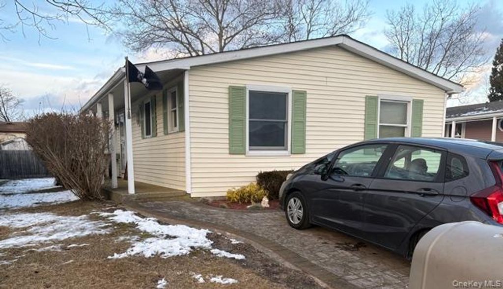 Photo of 42 Village Circle S, Manorville, NY 11949 (MLS # 954479)