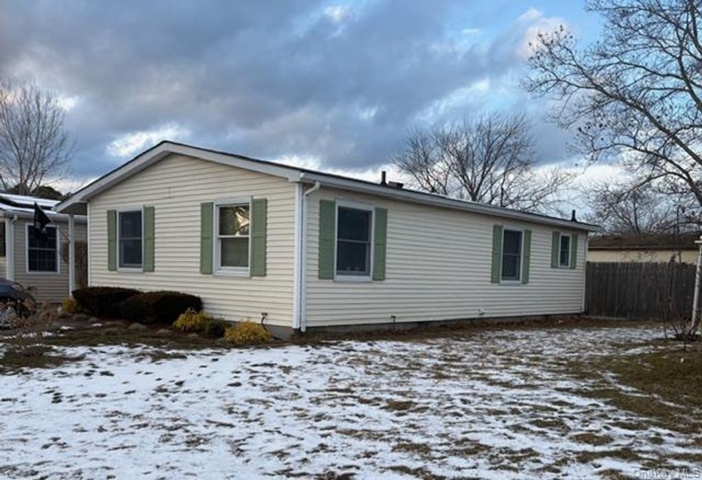 Photo of 42 Village Circle S, Manorville, NY 11949 (MLS # 954479)