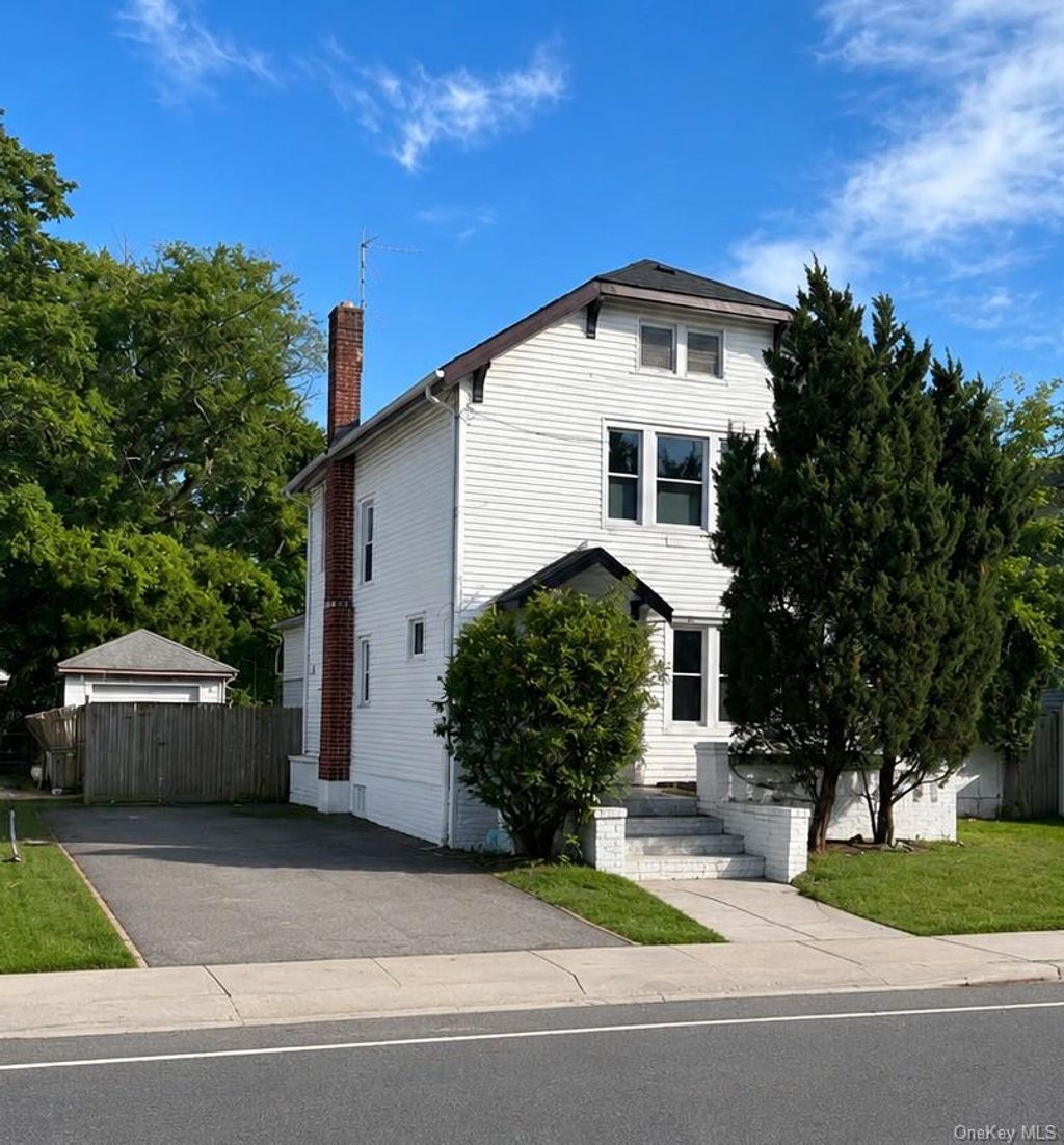 Photo of 499 W Broadway, Cedarhurst, NY 11516 (MLS # 1010303)