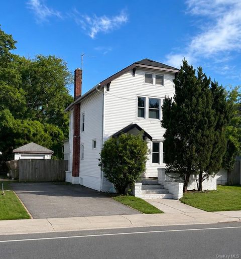 Photo of 499 W Broadway, Cedarhurst, NY 11516 (MLS # 1010303)